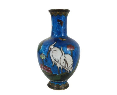 Japanese Cloisonne Enamel on Brass Small Vase. The baluster vessel decorated with two cranes and lily pads on a blue foil gro