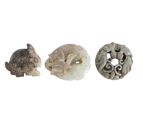 Three Variously Colored Jade Studies Qing Dynasty, late 19 th Century. Comprising a black and white mottled rabbit, a pale gr