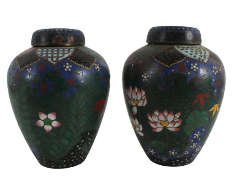 Pair of Japanese Cloisonne Enamel Covered Vases Each of tapering ovoid form, decorated with bright leafy flowers beneath a co