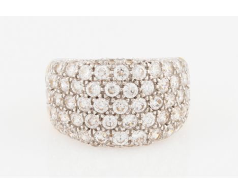 A cubic zirconia set ring, half band pave set with round cut cubic zirconias, stamped 750, ring size P, weight approx. 10.9g.