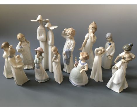 A selection of Spanish figurines to include Nao, one Lladro, two Zaphir, one Rex, one D’Art SA, etc.