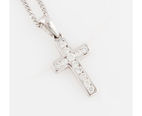 A diamond set cross pendant, indistinctly marked, on an 18ct white gold curb link chain, hallmarked Sheffield, weight approx.