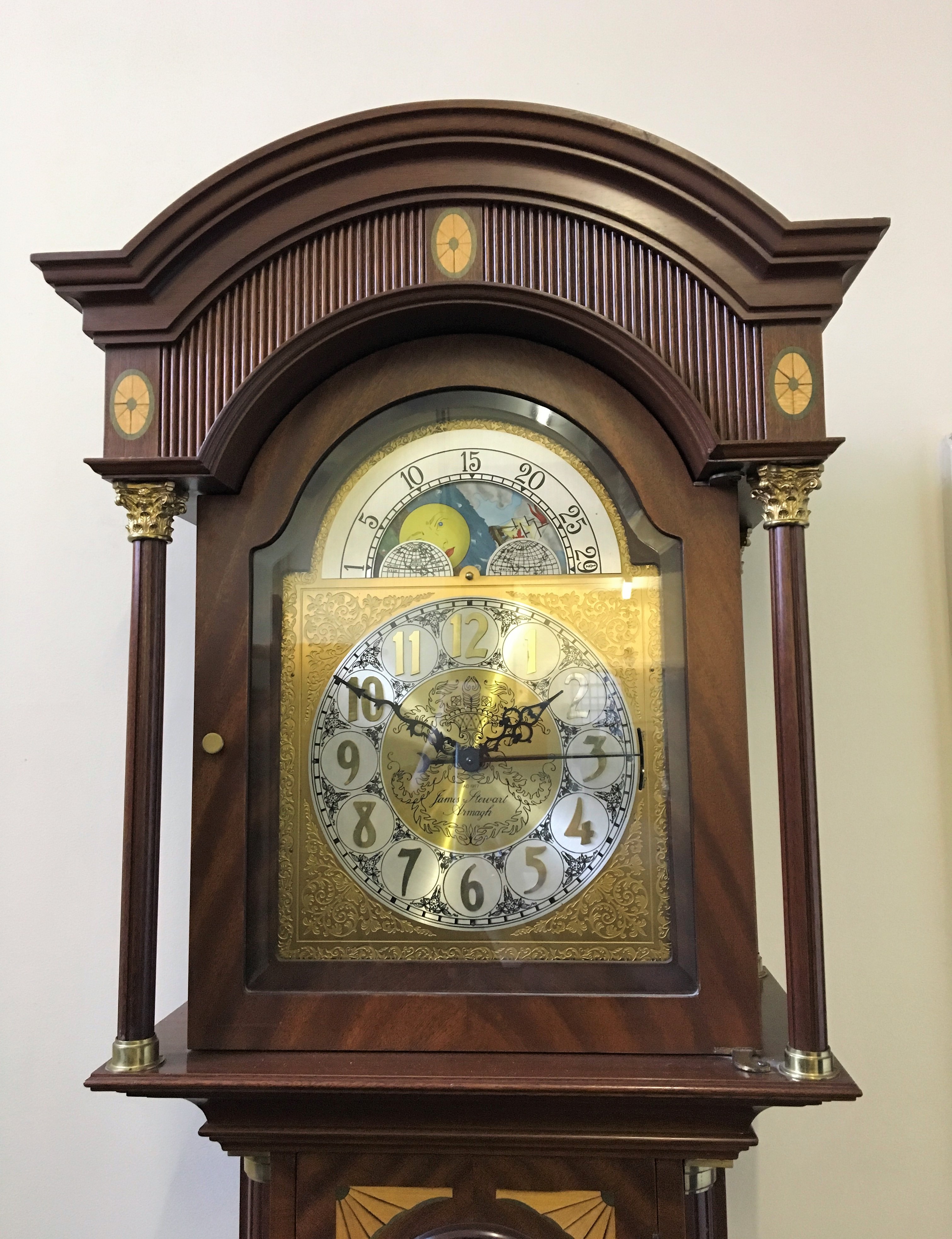 A James Stewart Armagh reproduction mahogany grandfather clock with