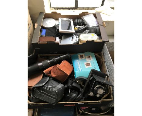 Three boxes of various camera equipment, accessories and electronics.