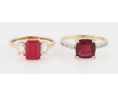 Two 9ct yellow gold ruby rings, set with additional colourless stones, both hallmarked Birmingham, ring sizes N½, (2).