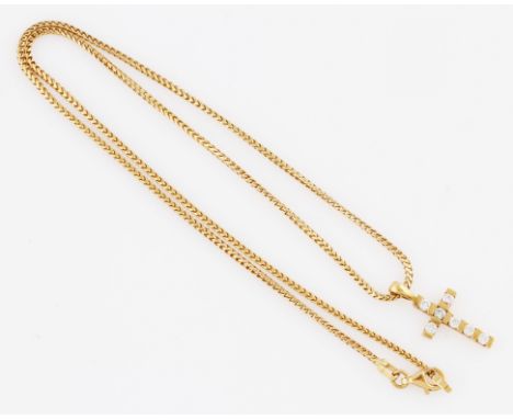 An 18ct yellow gold diamond cross pendant, bar set with seven round brilliant cut diamonds, total diamond weight approx. 0.50