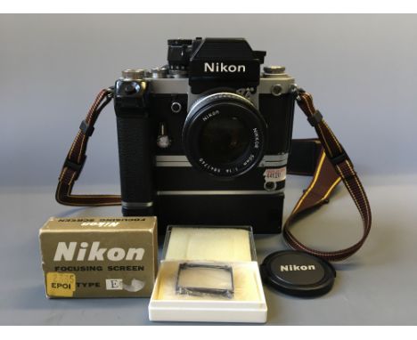 A Nikon F2 SLR camera with attached MD-2 and MB-2 bodies, together with a Nikon Nikkor 50mm 1:1.4 lens with cap, and a Type E