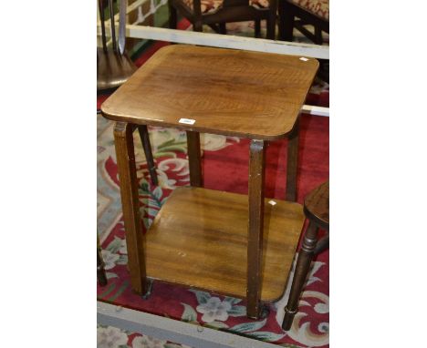 An Art Deco walnut two tier sitting room table