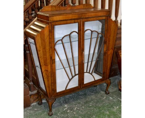 A 1930's Art Deco walnut display cabinet. 