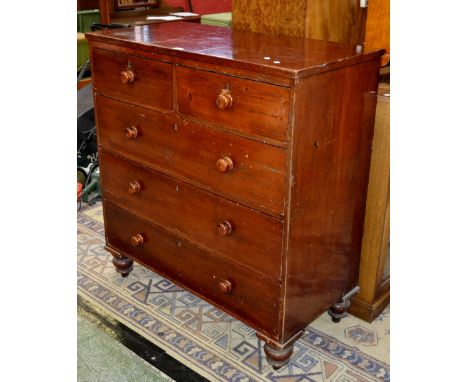 A stained pine Victorian chest of two short over three long, button handles, turned feet. 117cm high x 108cm wide x 53.5cm de