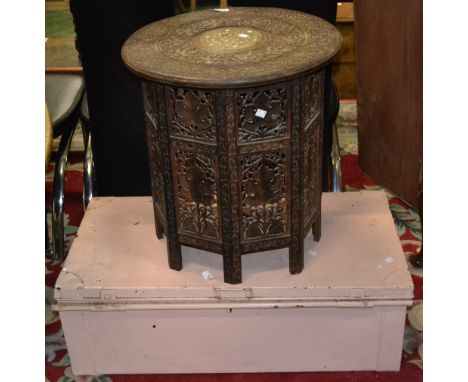 A folding inlaid Eastern table with circular top; a painted tin trunk (2)