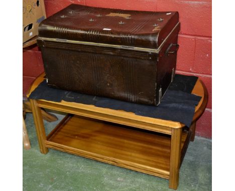 A teak coffee table; a circular pedestal table; a tin trunk (3)