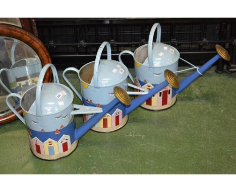 Three vintage galvanized watering cans decorated with hand painted enamel Devon coastal scenes, painted by R. Harrison.
