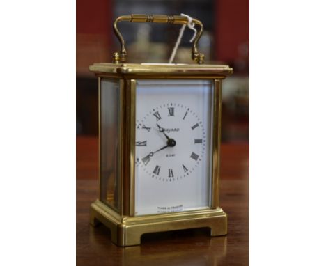 A French brass carriage clock, eight day movement