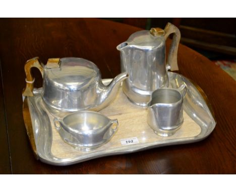 A stylish Piquotware 1950's four piece tea and coffee service, on matching tray