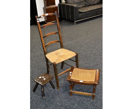 A 19th century milking stool; a 20th century oak ladder back rush seated chair; an oak Bergere stool 