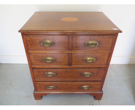 A mahogany 4 drawer chest of small proportions, the top 2 drawers with double moulding, 72cm tall x 64cm x 46cm 