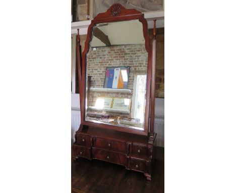 A Queen Anne style mahogany toilet mirror with six small drawers, 105cm tall x 57cm wide x 24cm deep 
