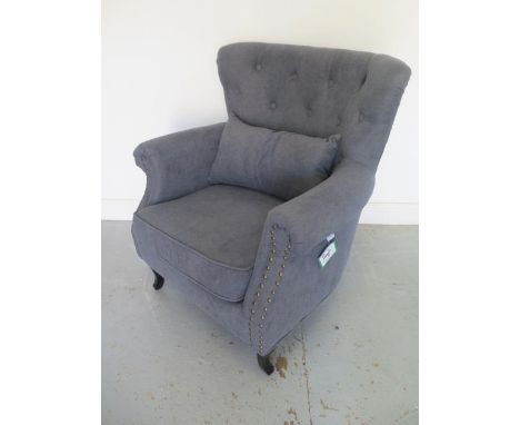 A Wayfair button back armchair with a cushion in unused condition, 90cm tall x 76cm wide 
