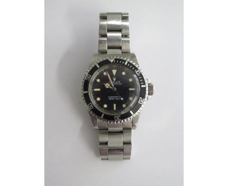 A Rolex stainless steel 1984 Oyster Perpetual Submariner 660ft-200m gents bracelet wristwatch, model 5513 serial 8309917 with