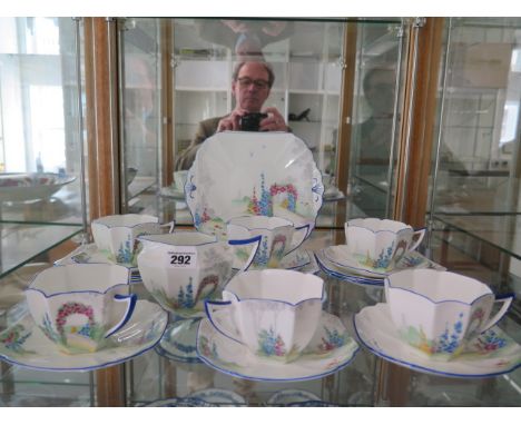 A Shelley 6 piece teaset with 6 cups, saucers, plates, sandwich plate and milk jug Rd 723404 pattern F11606 Garden Arch, all 
