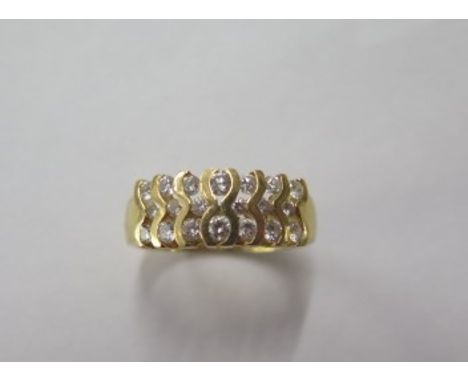 An 850 yellow gold diamond ring, size K, approx 5 grams, signs of re-sizing but diamonds bright and good condition 