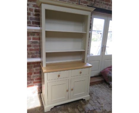 A Neptune Chichester kitchen dresser with an adjustable shelf top above two drawers and two cupboard doors, 208cm tall x 106c