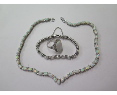 An opal effect necklace 43cm long in white metal setting and a matching opal effect bracelet marked 925- please note necklace