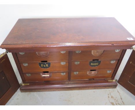 A counter top mahogany Ambergs letter file cabinet with 6 internal drawers, 45cm tall x 77cm x 35cm 