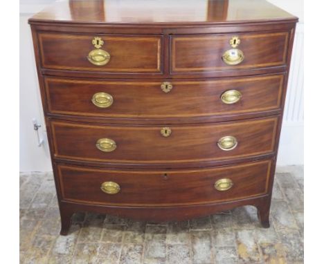 A Georgian mahogany bow fronted chest with 2 short drawers over 3 long drawers on splayed bracket feet, 106cm tall x 105cm x 