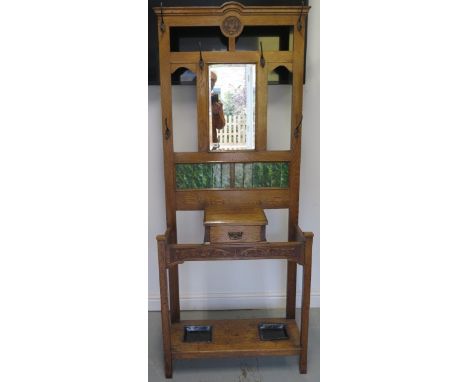 An oak mirror and tile back hallstand with glove drawer, 192cm tall x 80cm 