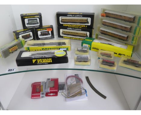 A collection of boxed N gauge rolling stock and three locos, Mintrix, Graham Farish and Peco, please see images for listing 