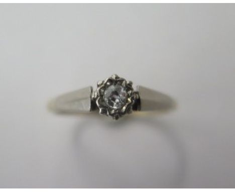 A 9ct and platinum solitaire diamond ring, size K, approx 1.7 grams 