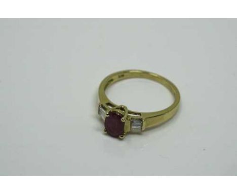 A 10ct gold ruby and diamond ring, the central ruby approximately 1ct, 2.6g, size N.