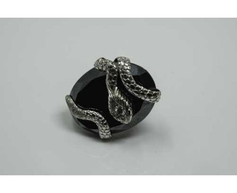 A large 18ct white gold (tested) agate and diamond snake ring, size K/L. CONDITION REPORT: The shank is not marked.