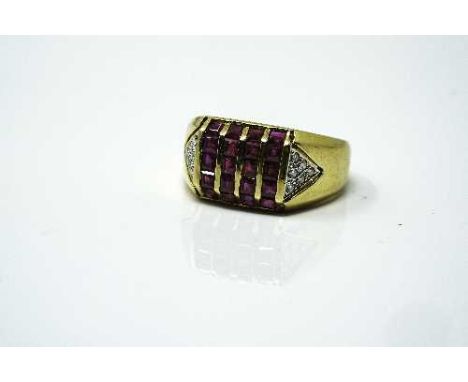 A good quality 18ct yellow gold ruby signet ring set with diamond shoulders, 7.1g, size N.