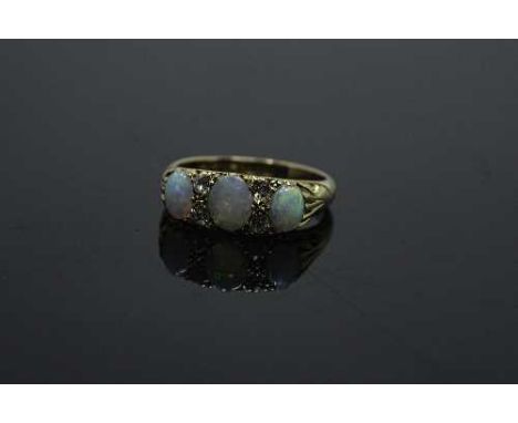 An antique 18ct gold opal and diamond ring, size M/N.