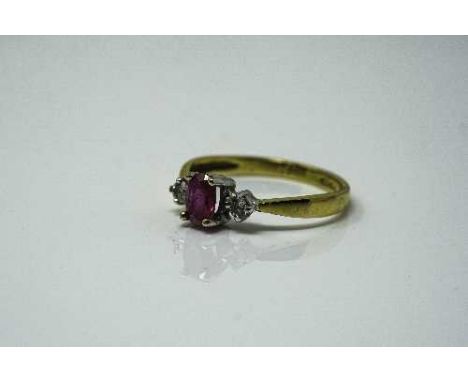 An 18ct yellow gold ruby and diamond ring, 2.5g, size M/N.