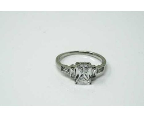 A Sterling silver Art deco style emerald cut ring, size N.