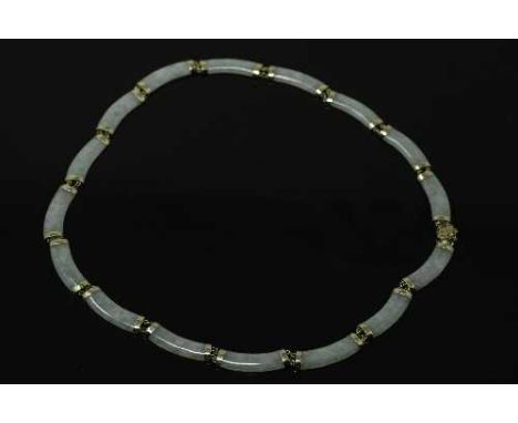 A 14ct yellow gold mounted jade necklace 