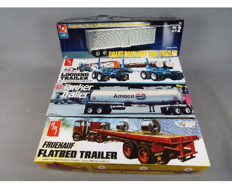 AMT, AMT ERTL - Four boxed 1:25 scale model kits to include Amoco Tanker Trailer, Fruhauf Flatbed Trailer, Great Dane Dry Van