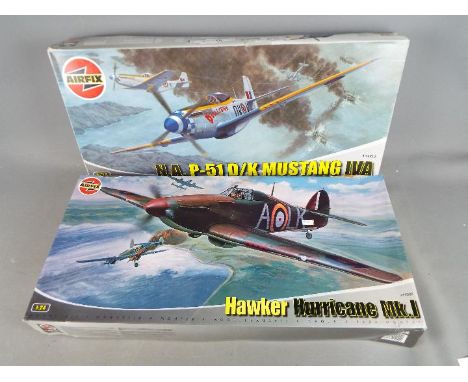 Airfix - Two boxed 1:24 scale plastic model aircrfat kits by Airfix. Lot contains Airfix A14002 Hawker Hurricane Mk.I; and Ai