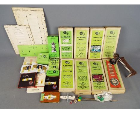 Subbuteo - A collection of eight vintage Subbuteo teams, with some boxed accessories together with some scratch built accesso