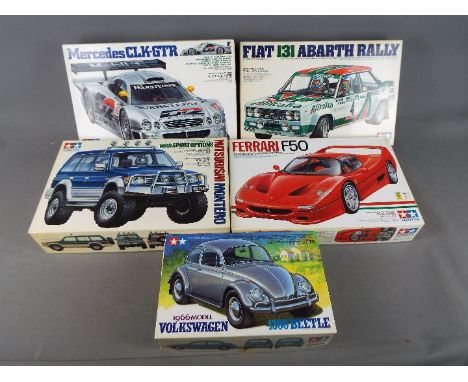 Tamiya - Five boxed 1:20 and 1:24 scale model kits to include Ferrari F50, Fiat 131 Abarth Rally, Volkswagen 1300 Beetle 1996