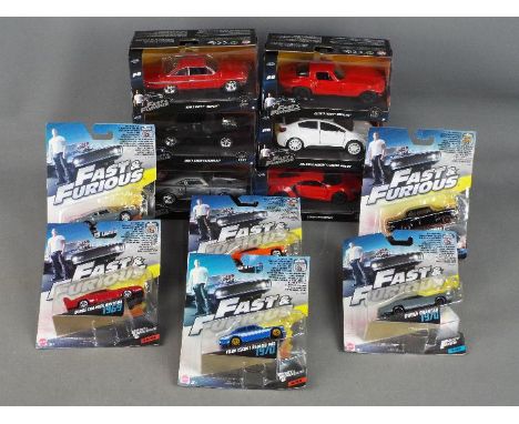 Jada Toys, Mattel - 12 boxed / carded 'Fast &amp; furious' diecast model cars in 1:55 and 1:32 scale from Jada Toys and Matte