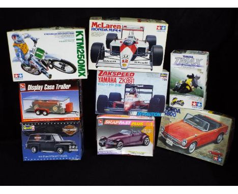 AMT, Tamiya, Hasegawa - Eight boxed plastic model vehicles kits in various scales. Lot includes AMT#8216 1:25 scale Display C