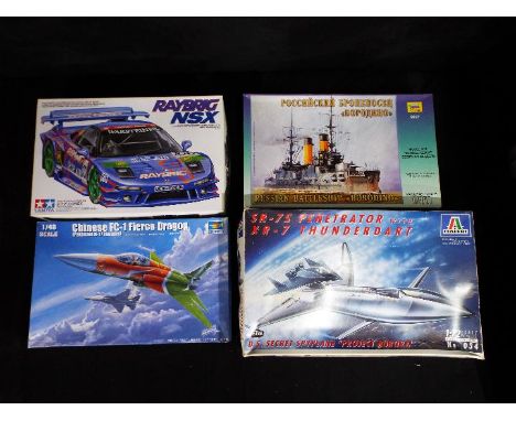 Tamiya, Trumpeter, Zvezda; Italeri - Four boxed plastic model vehicle kits in various scales. Lot includes Tamiya #24204 1:24