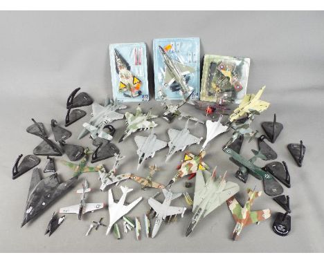 Italeri, Fabbri - Over 20 predominately unboxed diecast model aircraft in various scales . Lot includes B52 Bomber; F-104S St