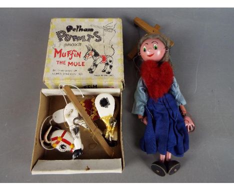 Pelham Puppets - Two boxed vintage Pelham Puppets. Lot includes Muffin the Mule in its original box with a Pelham Old Lady Pu