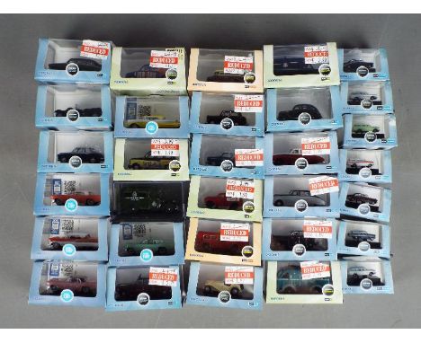 Oxford Diecast - A collection of 31 boxed diecast vehicles in 1:76 and 1:87 scale by Oxford Diecast. Lot includes American 19